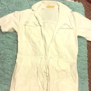 All white jumpsuit made by Lizette Collection